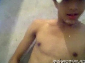 Gay Asian boy masturbates and cum on his face on webcam