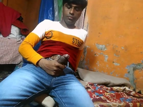 A young country boy with black hair has fun with his cock and fetishistic tendencies in a gay porn video.