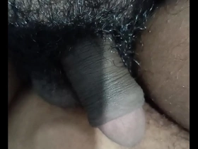 Steamy handjob scene with a hot shemale and a hairy dick ends with a facial.