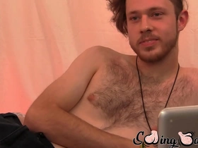 Hairy gay Woody Johnson enjoys cock tugging and a facial finish
