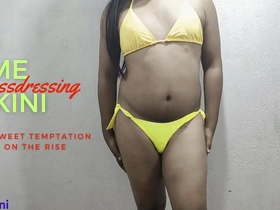 Hot lime Bikini wearing Indian transsexual in solo action.