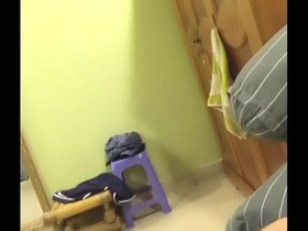 Gay Vietnamese man giving blow job to his step brother with an erection.
