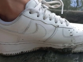 Jon Arteen enjoys playing in the mud with his Nike Air Force One AF1 sneakers on his bare feet. Gay foot fetish boy porn video.