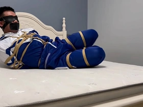 Continuation of the bondage and discipline of an Asian man with short hair.