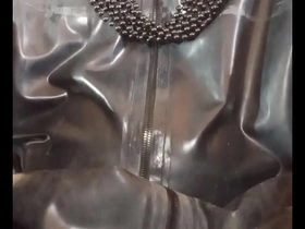 Amateur gay in shiny latex outfit