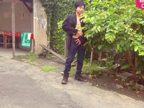 Hansel Thios solo performance in downtown garden for adult magazine photo shoot