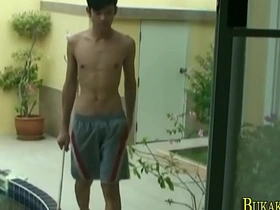 Asian twink gets spit roasted in a group sex scene