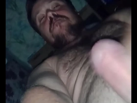 Gay masturbates with a big cock and comes hard