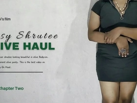 Beautiful transsexual Olive in a sexy strip tease.