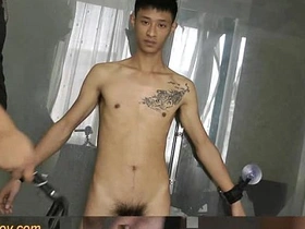Gay BDSM scene with naked slave boys and body spanking