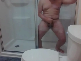 Solo boy enjoys gay sex in hotel shower and gets an anal creampie