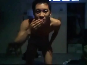 A smiling Asian beauty masturbates and cums on webcam