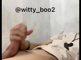 Alter Asian masturbates in front of camera