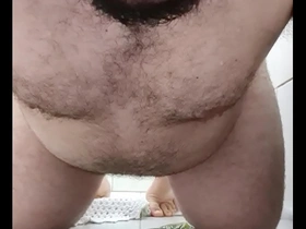 A chubby bear of a man after taking a shower.
