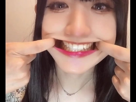 Crossdresser with a tooth fetish masturbates.