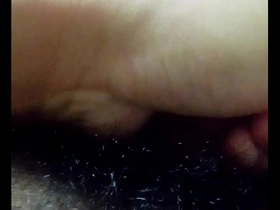 Close up of an Asian man pleasuring himself.