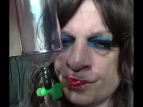 Cross-dressing bisexual gay Mark Wright continues to enjoy drinking pee in this video.