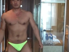Tony, the Asian male model, showing off his body and wanking.