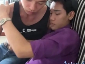 Gay Asian twinks having hot sex on the sofa